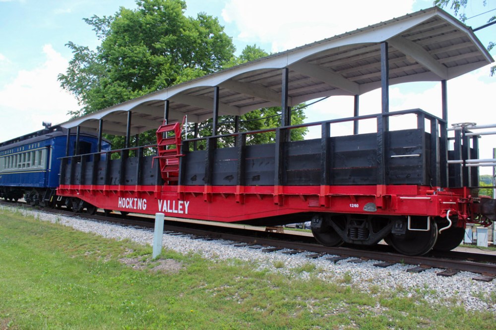 a large long train on a steel track