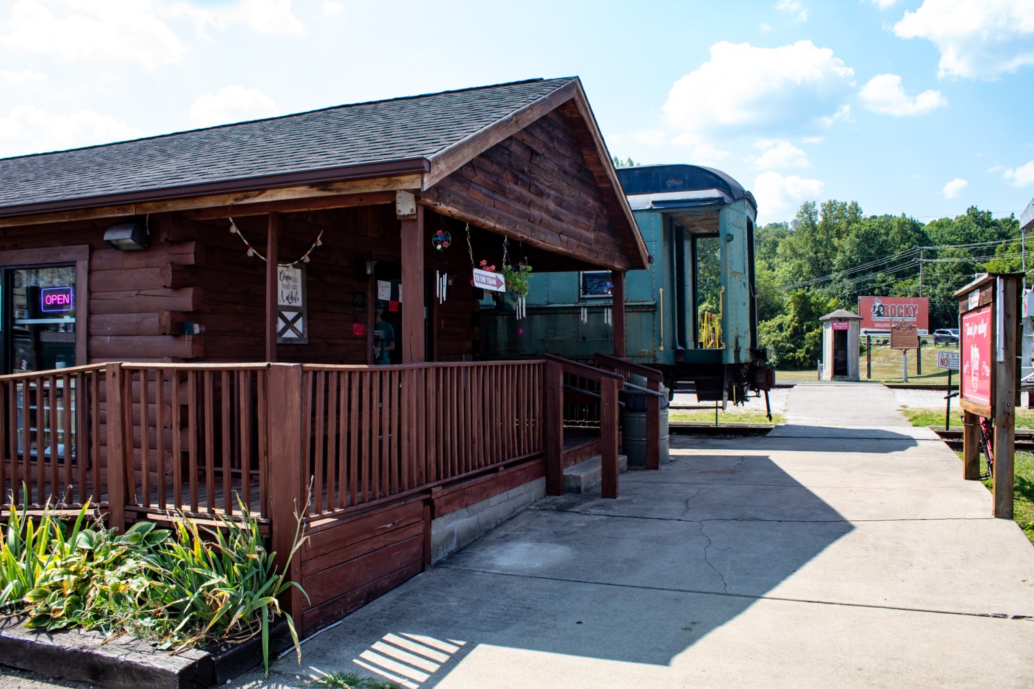 a train is parked on the side of a building